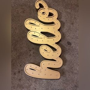 this is a wall sign that you hang up & it lights up!!